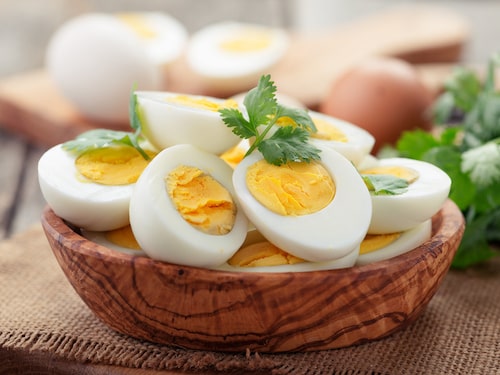 Eggs in wooden bowl